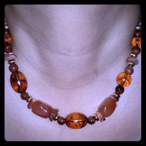 Orange jeweled necklace